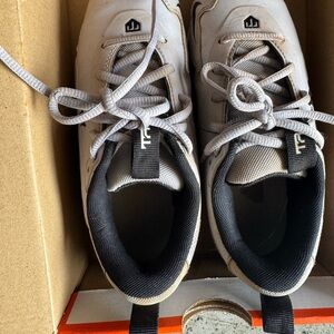 Light Gray Athletic baseball cleats with Black Collar